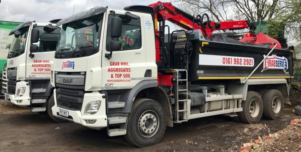 Grabserve grab wagons parked in yard