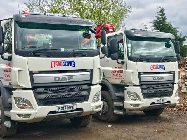 Grabserve grab wagons parked in yard