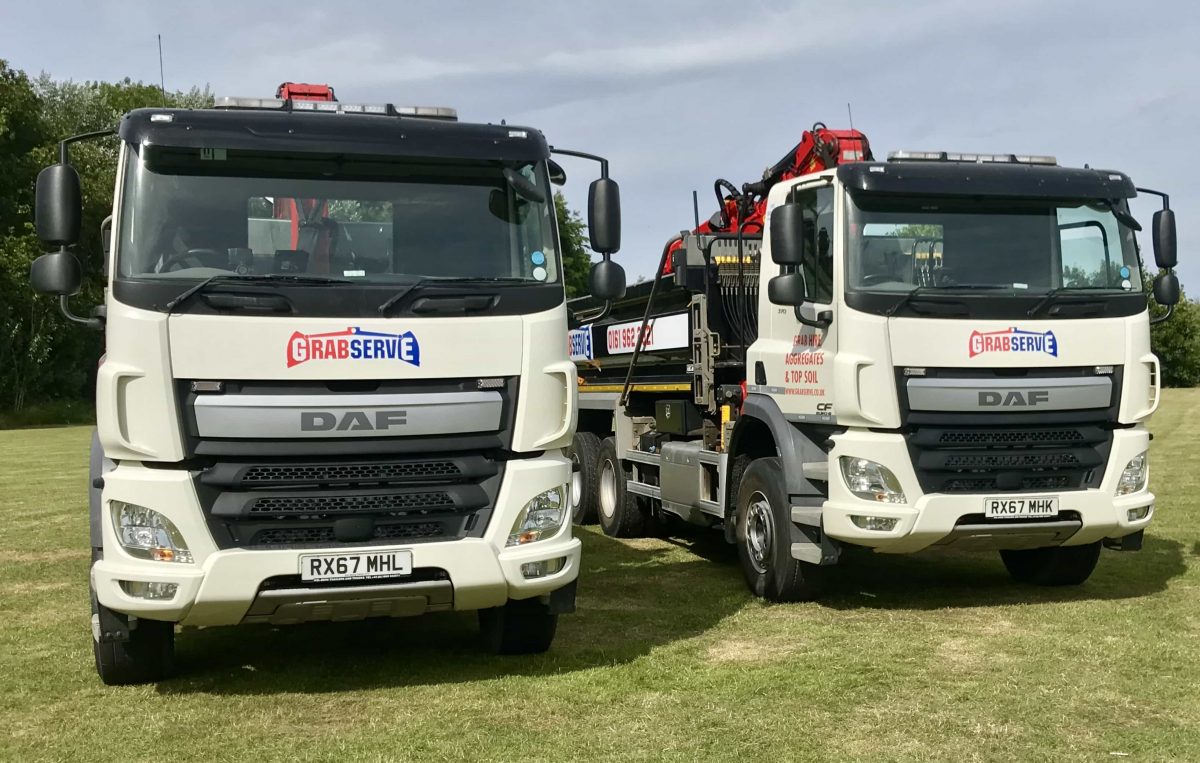 Grabserve grab wagons parked on grass